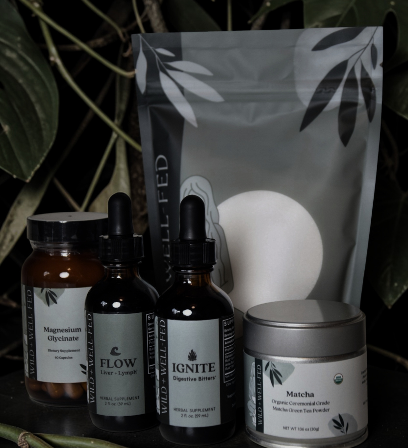 Collection of natural health products with labels on a dark background