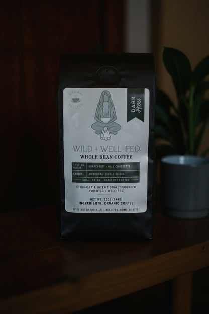 Coffee bag with a label on a wooden surface