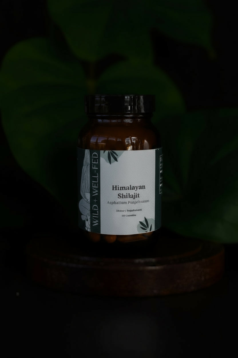 Bottle of Himalayan Shilajit with a label on a dark background