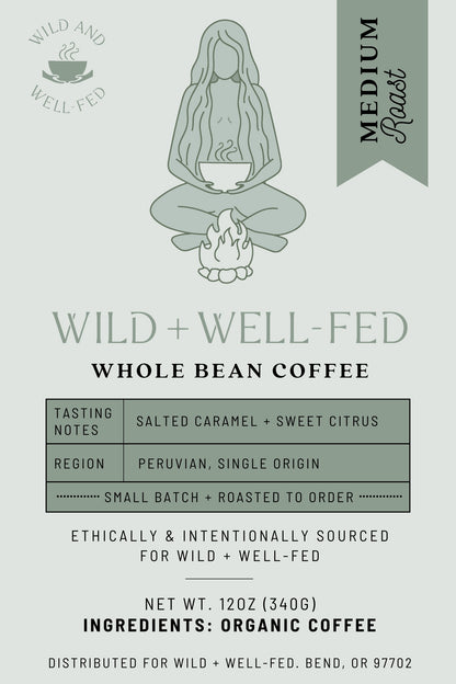 Coffee label for Wild + Well-Fed whole bean coffee with a person holding a cup design.